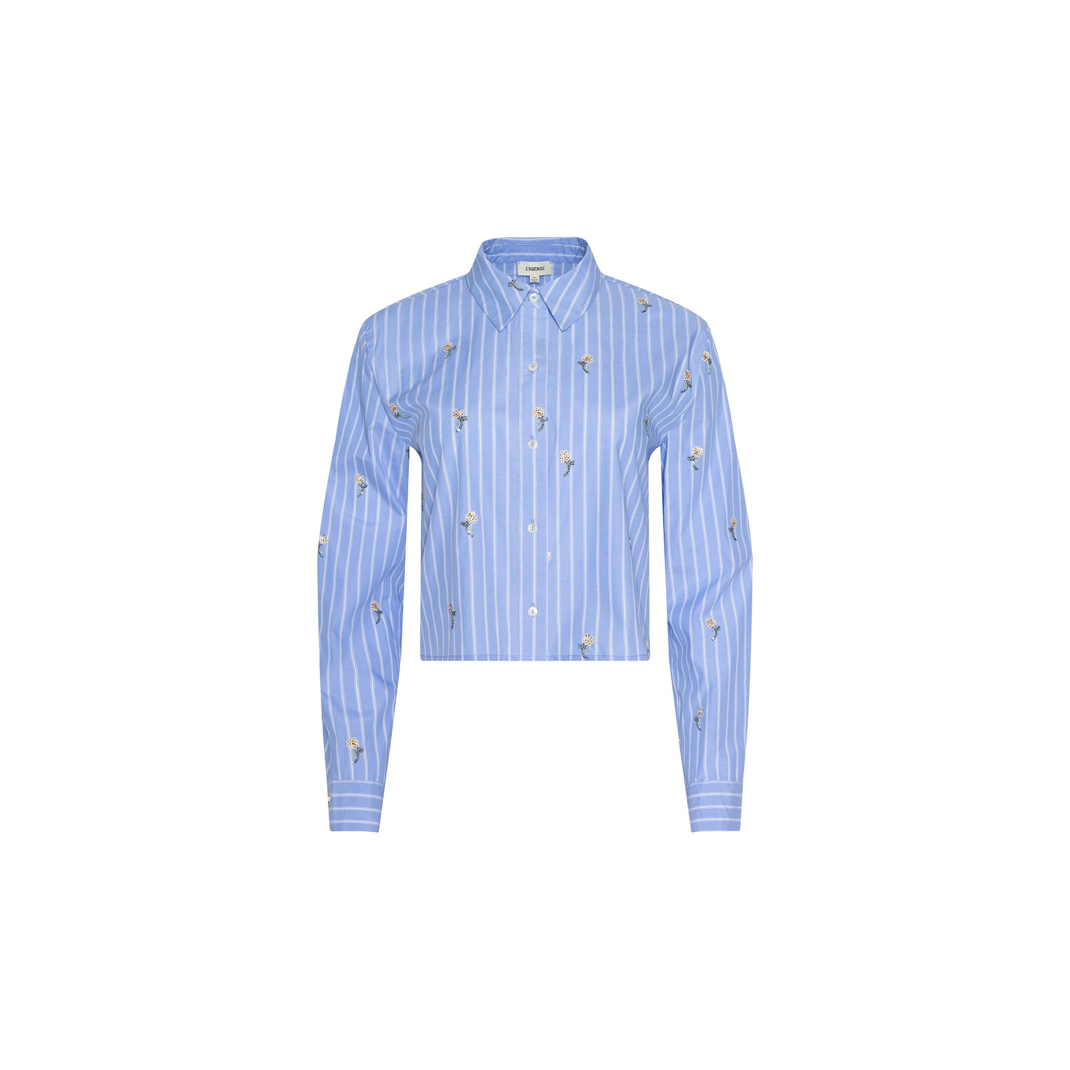 The Cosette Sequined Shirt is a blue, long-sleeve striped poplin shirt with white vertical stripes, small embroidered designs, and a cropped high-low hem, shown against a white background.