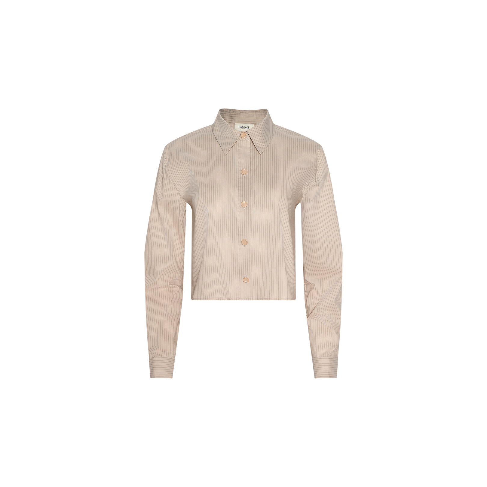 The Cosette Shirt is a beige, long-sleeved tailored shirt featuring a button-up front, classic collar, and cropped hem. Crafted from organic cotton, it is shown on a plain white background.