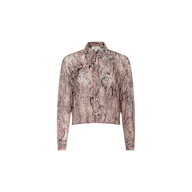 The Cosette Shirt is a lightweight, long-sleeve button-down with a collar and straight hem, featuring a modern cropped high-low silhouette. Showcased in brown and beige snakeskin print on a plain white background.