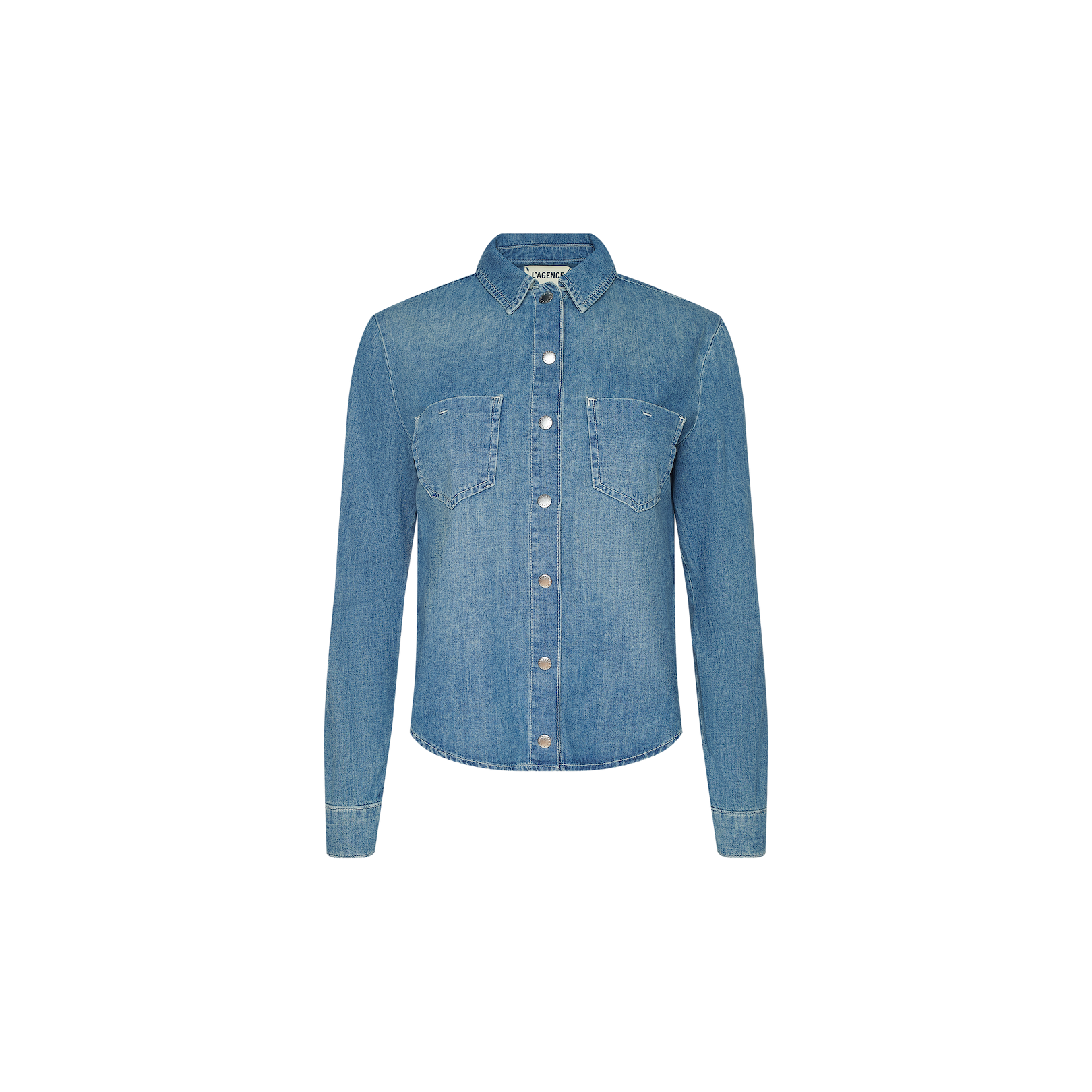 The Isla Shirt is a blue denim long-sleeve shirt made from featherweight denim, featuring a button-down front, two chest pockets, and a classic collar, displayed against a plain white background.