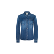The Isla Shirt is a lightweight blue denim shirt featuring long sleeves, two chest pockets, and a classic collar, displayed on a plain white background.