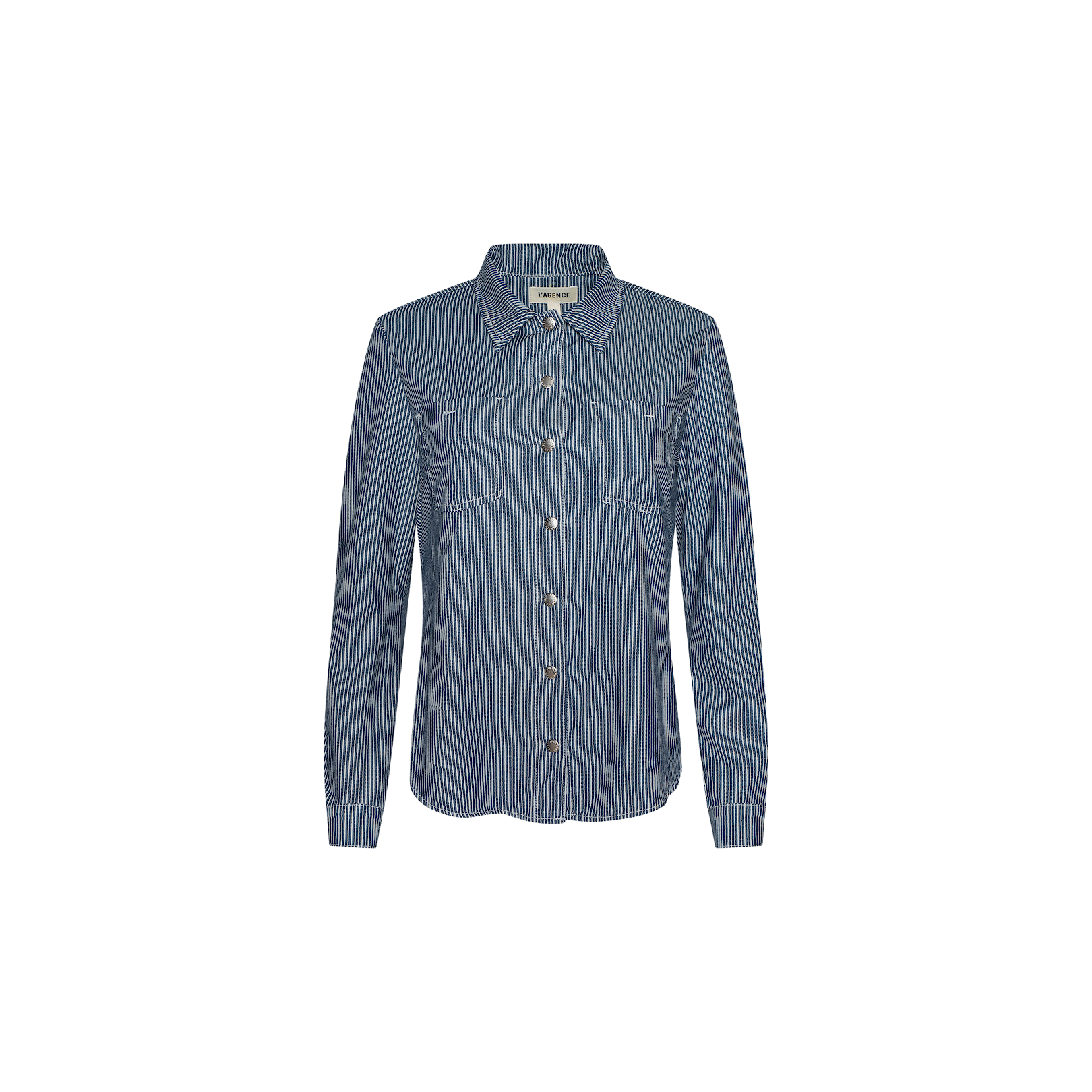 The Isla Shirt is a blue and white vertically striped long-sleeve button-up, featuring two chest pockets in a classic indigo pinstripe style, displayed on a plain white background.