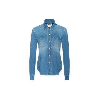 The Isla Shirt is a long-sleeved, light blue vintage wash denim shirt featuring two chest pockets and a collar, displayed on a plain white background.