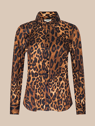 Introducing the Ellery Blouse: a long-sleeved, relaxed fit button-up with a classic collar, showcasing a striking brown and black leopard print on a beige background. Crafted from soft tencel, this blouse offers all-day comfort and effortless style.
