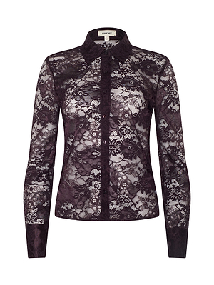 The Maia Floral Lace Blouse by L'AGENCE is a fitted, long-sleeved unlined blouse in dark purple sheer lace with a button-down front, pointed collar, and delicate floral pattern for an elegant, semi-transparent look.