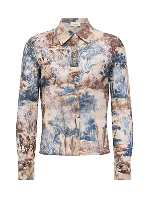 The Maia Printed Lace Blouse by L'AGENCE is a fitted, long-sleeved button-up with a pointed collar and Western toile print in blue, brown, and beige tones, featuring detailed outdoor landscape illustrations for a unique style.