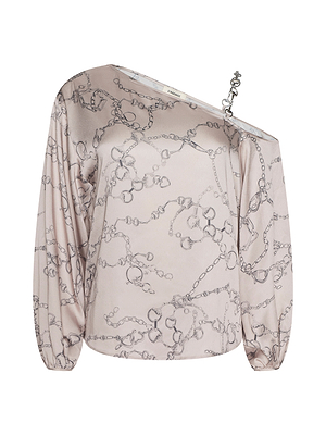 The Asami Chain One-Shoulder Blouse is a light pink satin top with a loose fit, long puff sleeves, an asymmetrical neckline, metallic chain strap detail, and a subtle horse bit chain print pattern.