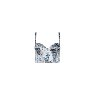 The Sonya Silk Bustier is a white cropped top with thin straps, featuring a vibrant butterfly and floral print in blue, green, and yellow tones on a plain white background.