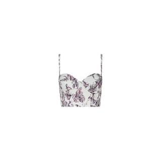 The Sonya Bustier is a cropped top with thin straps, showcasing a white base adorned with purple floral and butterfly prints. Designed with padded underwire cups for extra support, it is crafted from lightweight Tencel and displayed on a plain white background.
