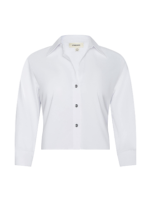 The Fawn Panther Print Shirt features long sleeves, a collar, black front buttons, and a straight hem in a classic design. Displayed on a white background.