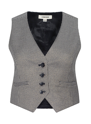 The Jianna Vest features a houndstooth pattern, deep V-neck, black buttons, two front pockets, and black satin lining. Inside the collar is the “L’AGENCE” label. Seen at Fall 2026 New York Fashion Week with a nod to historical romance.