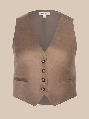 The Jianna Vest is a brown, cropped linen vest with a V-neckline, four gold front buttons, and two small front pockets, shown against a plain beige background.