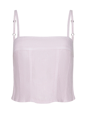 The Arlin Linen Tank is a light pink, sleeveless crop top with a square neckline, thin adjustable straps, and vertical front seams for a subtle corset-inspired look.
