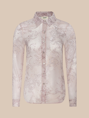 The Laurent Blouse is a sheer poly chiffon, long-sleeve button-up with a light pink and white floral pattern, pointed collar, and fitted cuffs, shown on a neutral beige background.