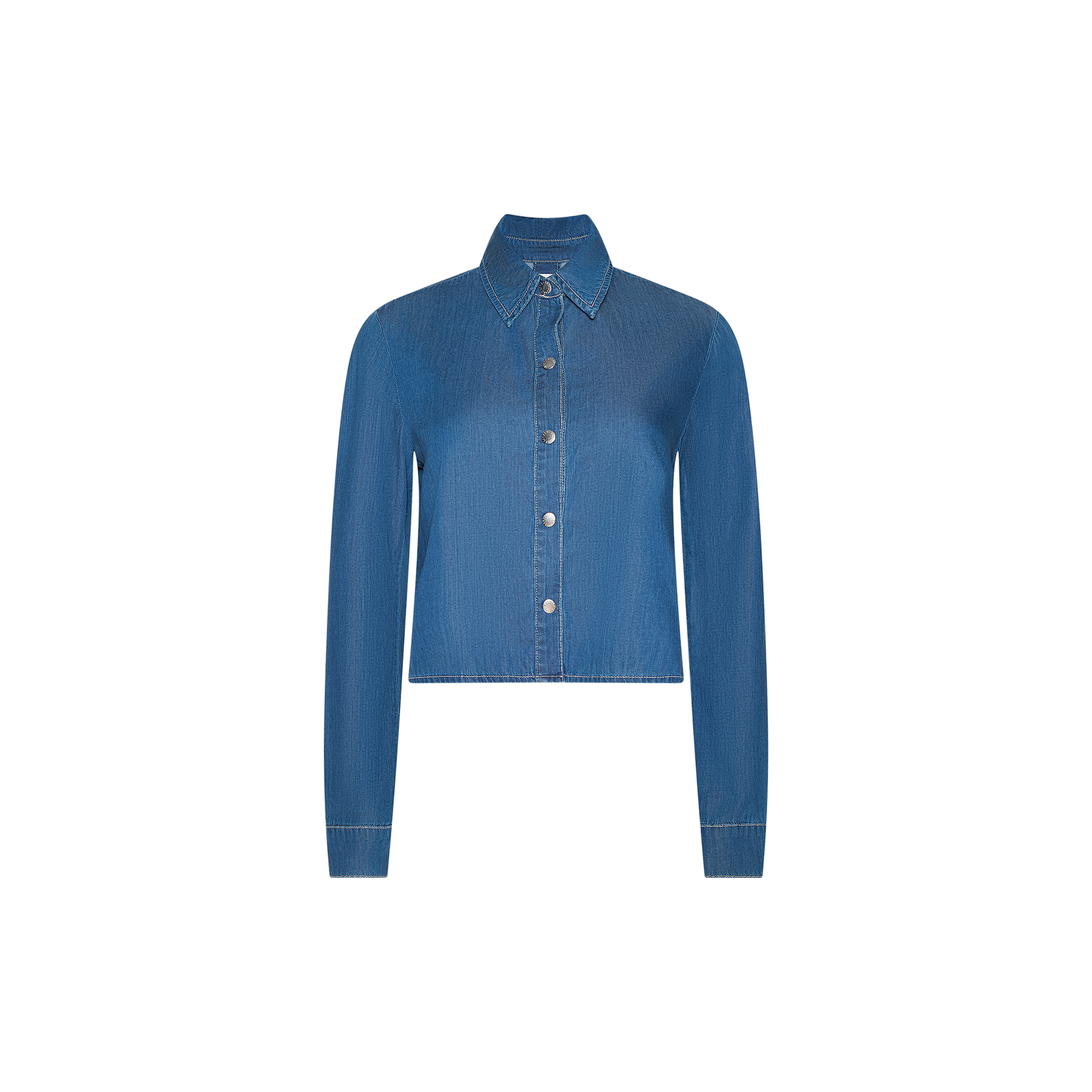 The Annette Chambray Shirt, featuring a blue color, long sleeves, a collared neckline, button-down front, and a relaxed fit, is displayed on a plain white background.