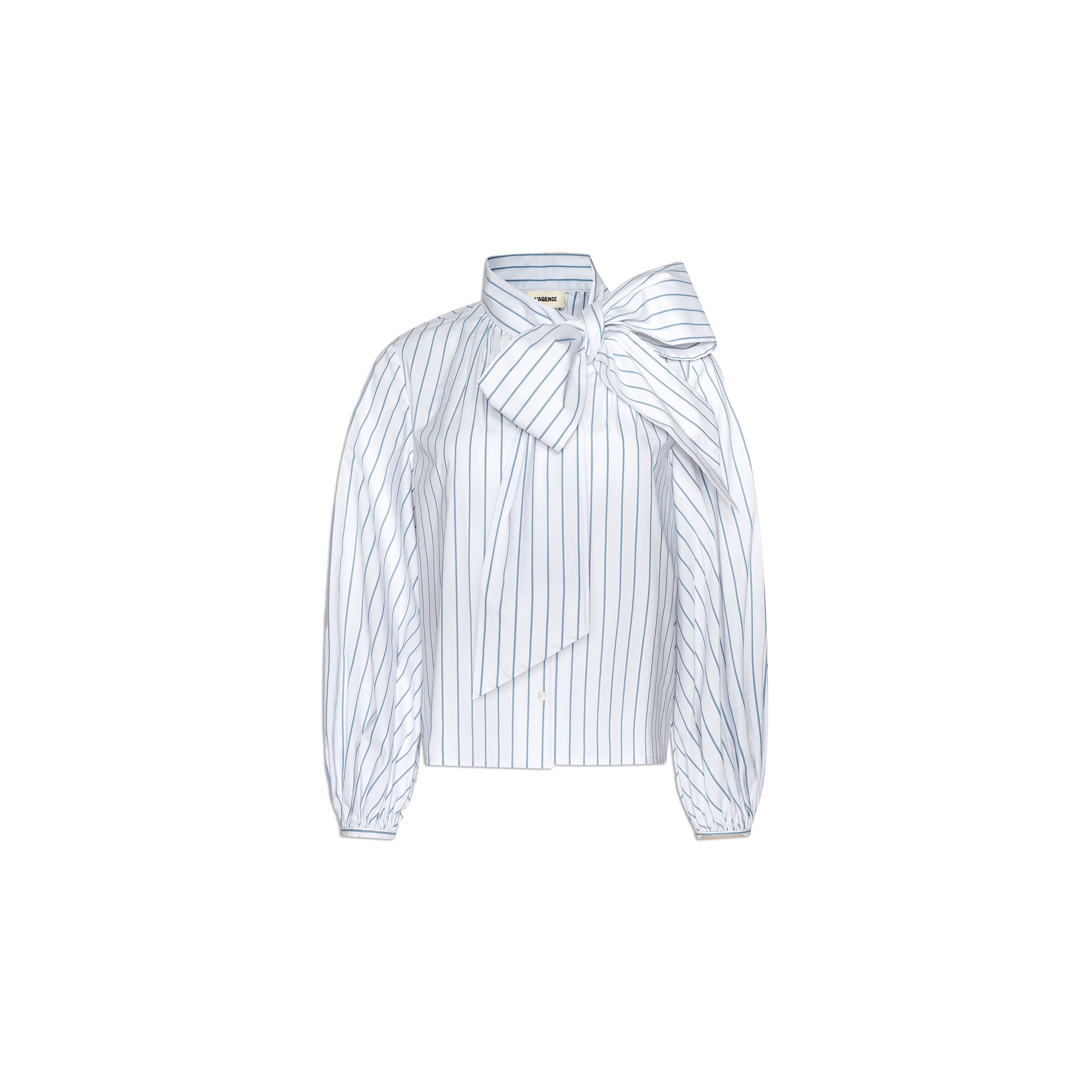 The Deon Tie-Neck Blouse is a white long-sleeve blouse made from a soft organic cotton-blend, featuring thin vertical blue stripes, blouson sleeves, and a large oversized neck tie bow.
