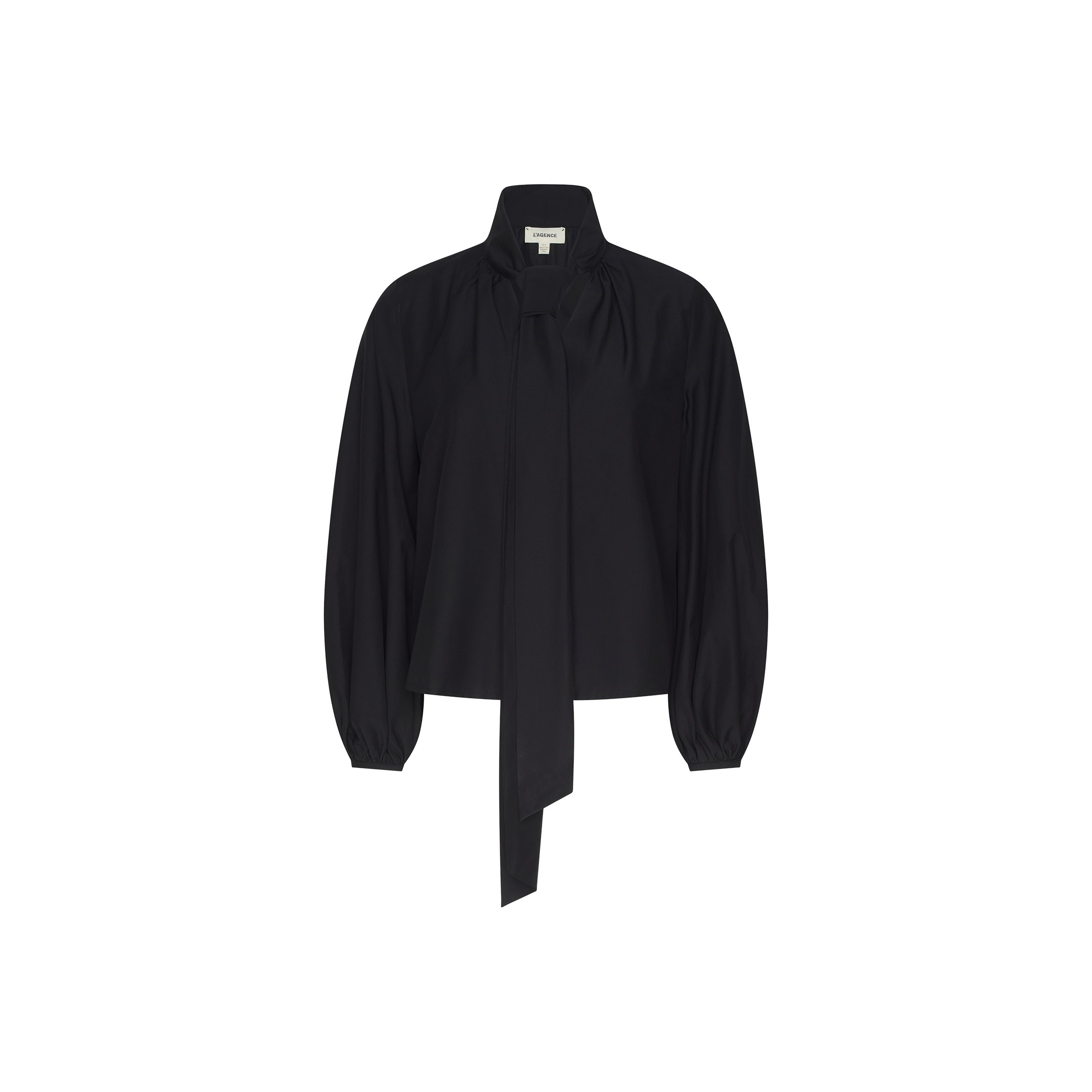 The Deon Tie-Neck Blouse is an oversized piece crafted from black organic cotton poplin, showcasing a high neck with an extended tie detail at the front, gathered shoulders, and blouson sleeves with loose cuffs, presented against a plain white background.