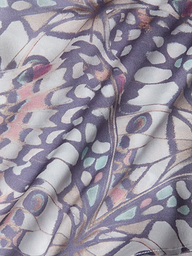 Close-up of the Calista Satin Camisole, softly draped and bias-cut, featuring a pastel butterfly wing print in shades of lavender, pink, blue, and white with abstract shapes and delicate lines.