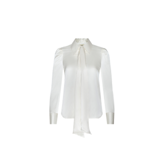 The Honey Silk Blouse is a white charmeuse top featuring long sleeves, buttoned cuffs, and a necktie bow detail, showcased against a plain white background.