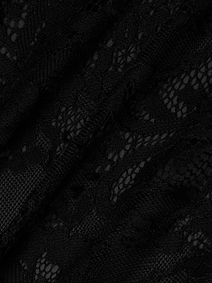 Close-up of the Caylee Lace Camisole by L'AGENCE, featuring intricate black floral and net patterns with a delicate, semi-transparent texture that highlights the fine detailing typical of luxury sheer lace camisoles.