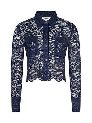 The Roelle Lace Blouse is a navy blue long-sleeve top with a collar, button-down front, front pockets, and scalloped edges. Made from sheer lace, it showcases an all-over delicate floral pattern.