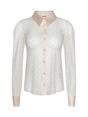 The Sophie Long-Sleeved Blouse is a sheer white blouse with a swiss dot pattern, light beige satin collar and cuffs, and beige buttons down the front. It features long sleeves and is displayed on a plain white background.