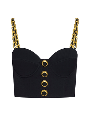 The Sophia Chain Bralette is a black bustier made from stretch suiting fabric, featuring gold chain straps, four bold gold grommets on the front, structured cups, and a fitted waist for a sleek look.