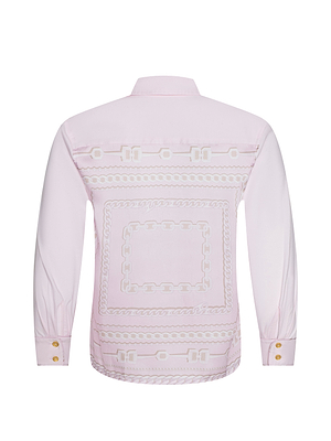 The Fawn Shirt is a light pink cropped button-down with a decorative chain and rope pattern on the back, classic collar, and gold cuff buttons for an elegant finish.