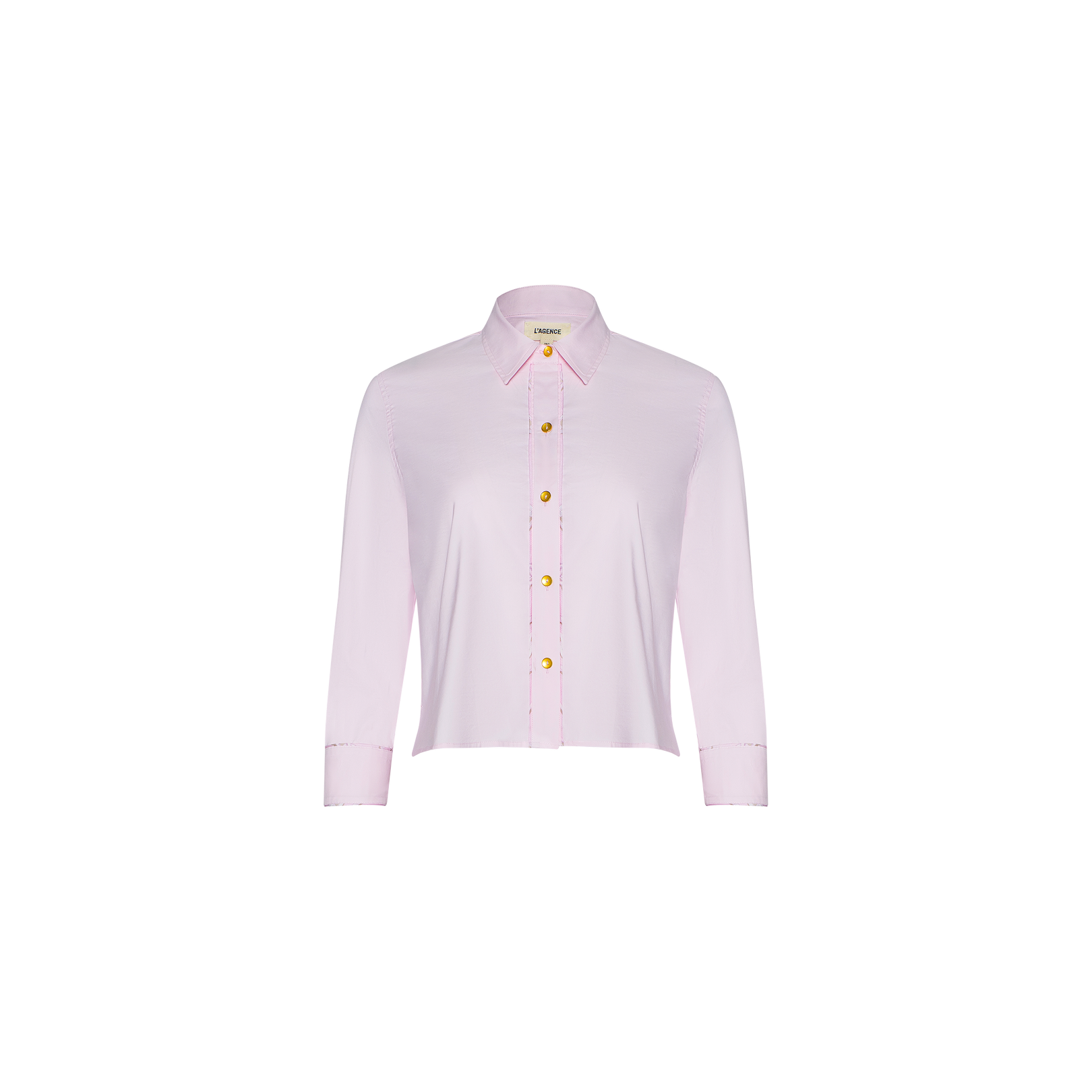 Fawn Shirt – a cropped pale pink shirt featuring long sleeves, a collar, and yellow buttons, displayed on a white background.