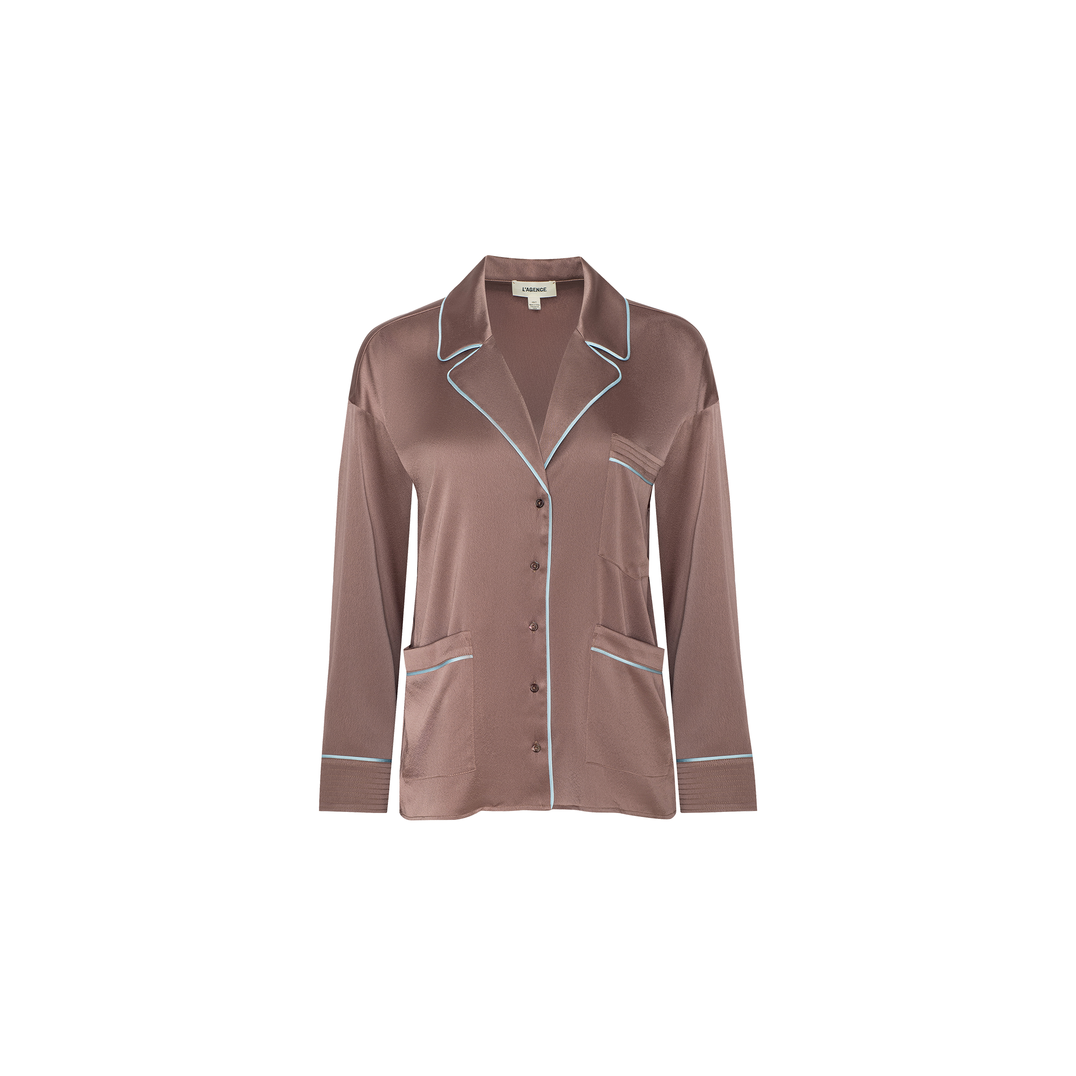 The Mara Blouse is a brown satin pajama top featuring a relaxed fit, long sleeves, white piping accenting the collar, cuffs, and pockets, and a front button closure, shown against a plain white background.