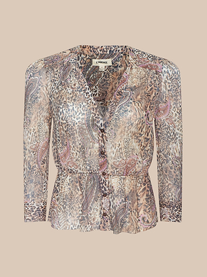 The Suri Top is a sheer long-sleeve blouse with animal and paisley prints in earthy tones, featuring a v-neckline, button-down front, fitted waist, and slightly flared hem.