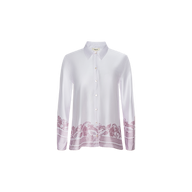 Judy Blouse: White long-sleeve button-down shirt featuring a classic collar with a purple floral pattern accenting the cuffs and lower hem, displayed on a plain white background.