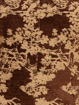 Close-up of the Paulette Corset Top in brown and beige floral jacquard brocade, highlighting the intricate woven patterns, symmetrical floral motifs, and a vertical center seam that showcases its detailed texture and fashion-forward design.