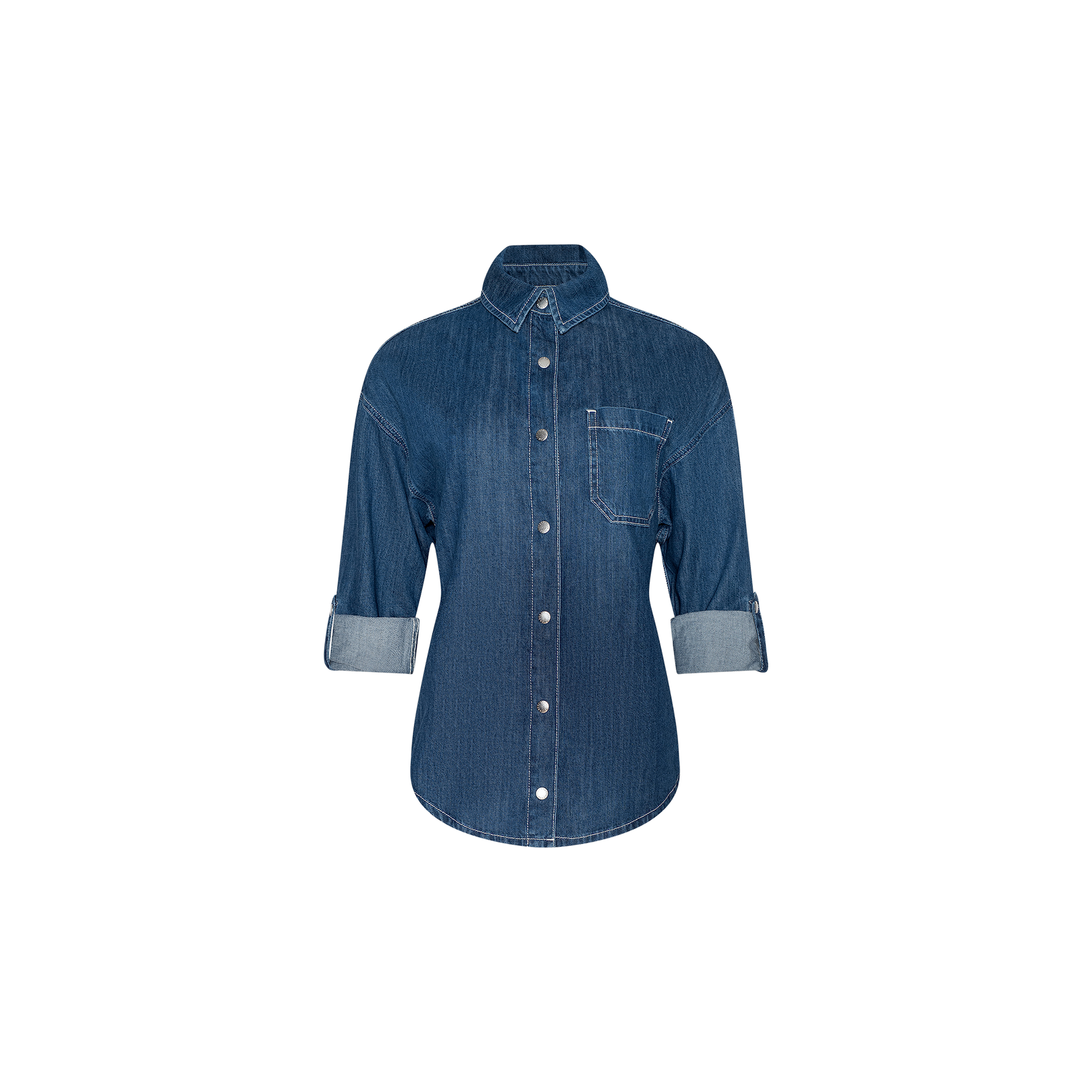 The Jorah Oversized Shirt is a blue denim top featuring long sleeves rolled to the elbows, a front chest pocket, and visible white stitching, displayed on a plain white background.