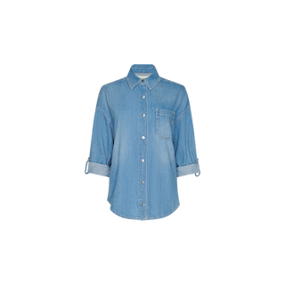 The Jorah Oversized Shirt is a light blue featherweight denim button-up with a collar, single chest pocket, and rolled-up sleeves, shown against a plain white background.
