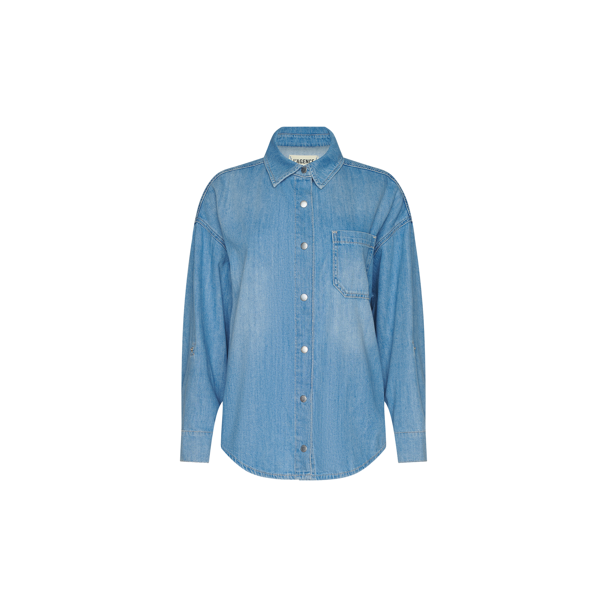 Light blue Jorah Oversized Shirt made from featherweight denim, featuring long sleeves, a collar, and a single chest pocket, shown against a plain white background.