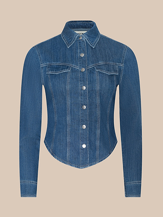 Louis Fitted Shirt in blue denim, featuring long sleeves, front snap buttons, a pointed collar, and two chest pockets that evoke equestrian sophistication, displayed against a plain beige background.