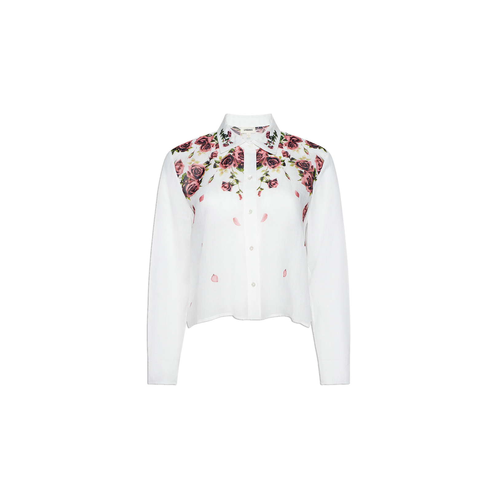 The Philomena Blouse features a white, long-sleeve button-down design with a collared neckline. A floral pattern of pink and purple roses with green leaves accents the top front section and shoulders. Crafted from semi-sheer Ramie, this blouse offers an airy, elegant finish.