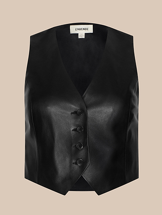 The Jianna Leather Vest, featuring a black cropped leather design with a V-neck, sleeveless cut, front button closure, and a subtle sheen inspired by Fall 2026 fashion trends and the iconic Jianna style, is displayed against a beige background.