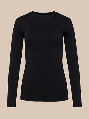 The Tess Long Sleeve Tee, a luxe microfiber crew neck in plain black, is displayed on a neutral beige background.