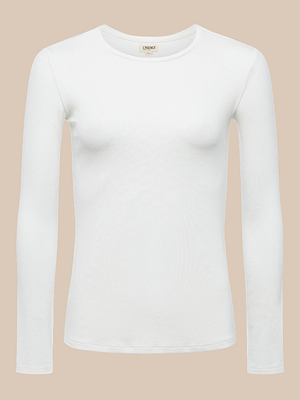 The Tess Long Sleeve Tee, a slim-fit white microfiber jersey crew neck shirt, is perfect as a versatile layering piece and is displayed on a neutral beige background.