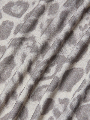 Close-up of the Ressi Fitted Tee featuring a gray leopard print on soft stretch jersey knit, with gentle folds and subtle shadows visible across the fabric.