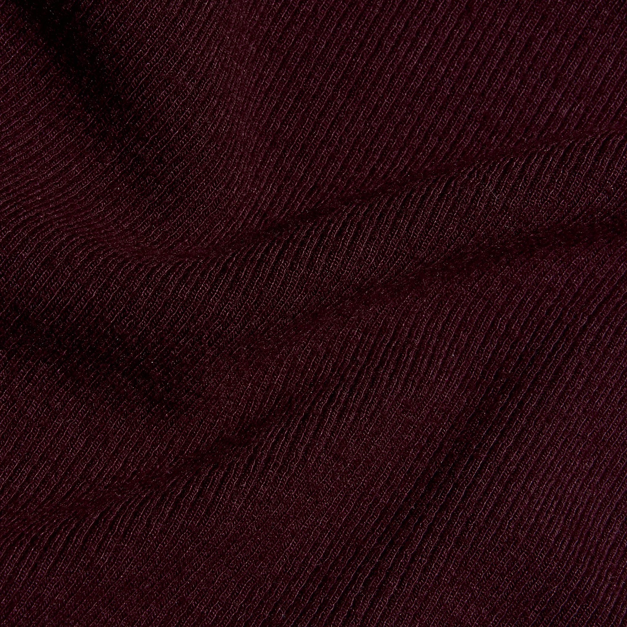 Deep purple stretch rib knit fabric with folds, shown on the Ceci Sleeveless Turtleneck.