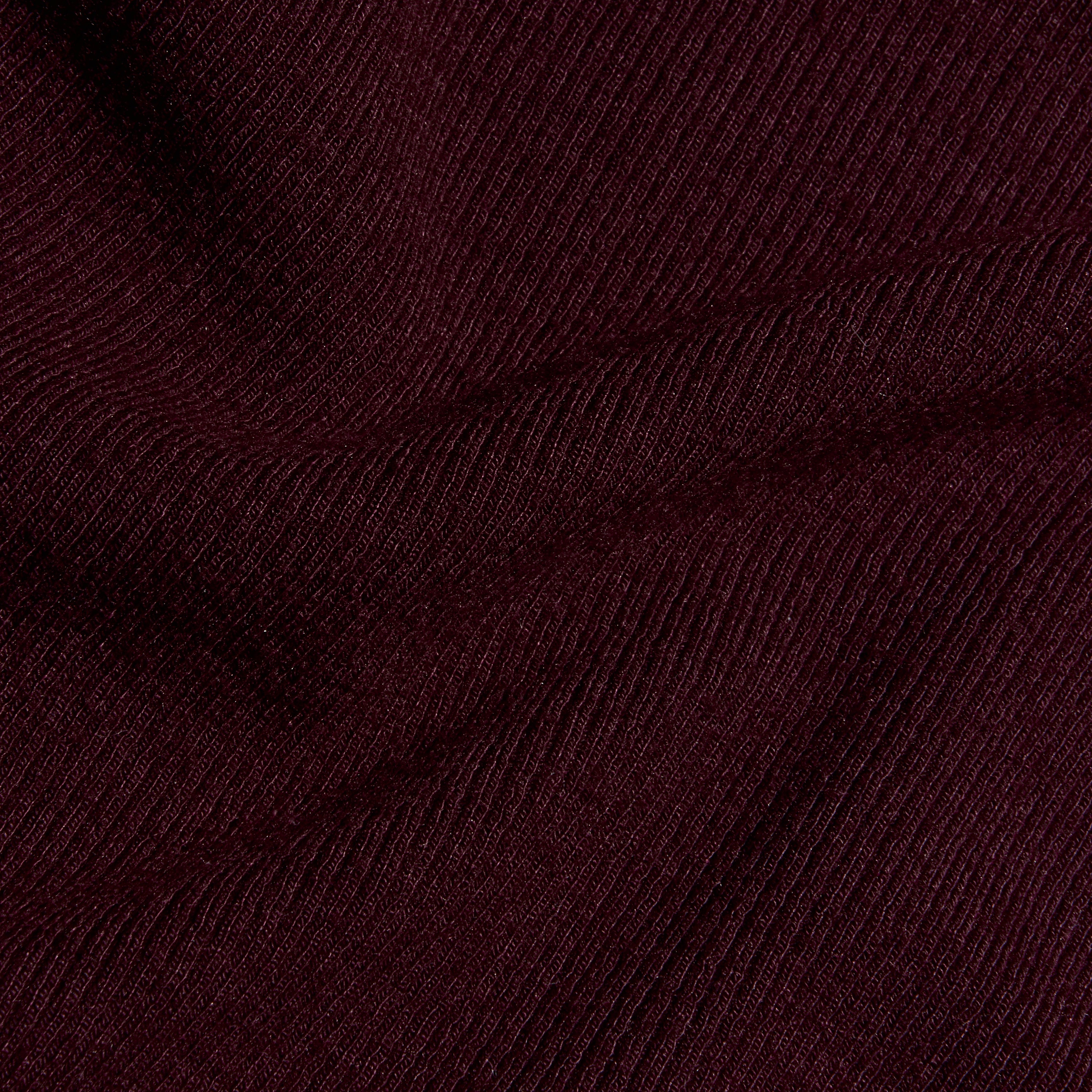 Deep purple stretch rib knit fabric with folds, shown on the Ceci Sleeveless Turtleneck.