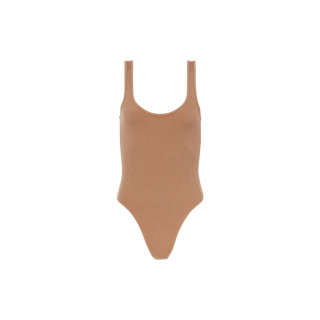 The Nica Scoopneck Bodysuit, shown in tan on a plain white background, features a sleeveless design crafted from stretch rib fabric with a scoop neckline and high-cut legs—making it an ideal and versatile base layer.