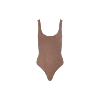 The Nica Scoopneck Bodysuit is a brown ribbed piece with a sculpted fit, showcasing a sleeveless design, scoop neckline, and high-cut legs, displayed against a plain white background.
