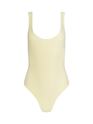The Nica Scoopneck Bodysuit is a sleeveless, light yellow ribbed base layer with a scoop neckline and high-cut legs, shown on a plain white background.