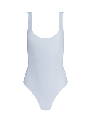 The Nica Scoopneck Bodysuit features a light blue ribbed design, wide straps, scoop neckline, and high-cut legs for a sculpted fit. Versatile as a base layer or swimwear. Shown on a plain white background.