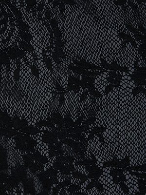 Close-up of the Peonie Lace Bodysuit highlights its sheer black lace fabric with intricate floral patterns and delicate mesh, creating a semi-transparent, textured look.