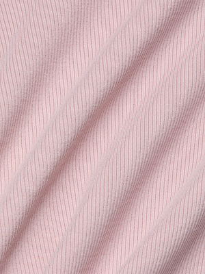 Close-up of the Adira Scoopneck Tank’s soft, light pink ribbed fabric with diagonal textured lines and gentle folds, highlighting its sculpted fit and high recovery stretch for lasting comfort.
